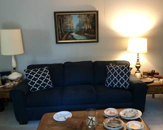 Like new Flexsteel, three cushion navy colored couch. Broyhill end tables. Large quality oak, coffee table.