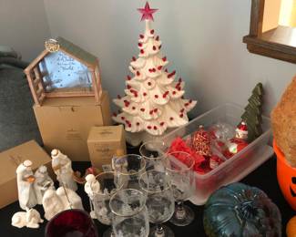 White ceramic Christmas tree with red bulbs, lots of quality holiday, such as Christmas, Halloween, some Easter, etc.