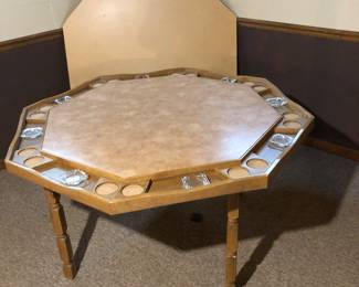 Folding gaming table with solid topper included.