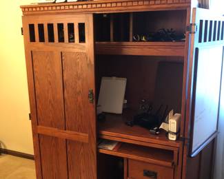 Nice Mission computer armoire. AT&T phones, computer speakers, miscellaneous office, supplies, net router, Office chair, and so much more.