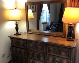 Heavy quality dresser with mirror and Stiffel lamps.