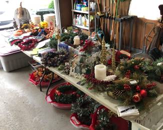 Loads of Christmas items, wreathes in Containers, and other holiday.