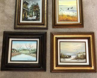 Many small oil paintings at the sale.