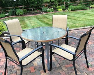 Patio set with four chairs.