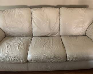 cream leather love seat cropped