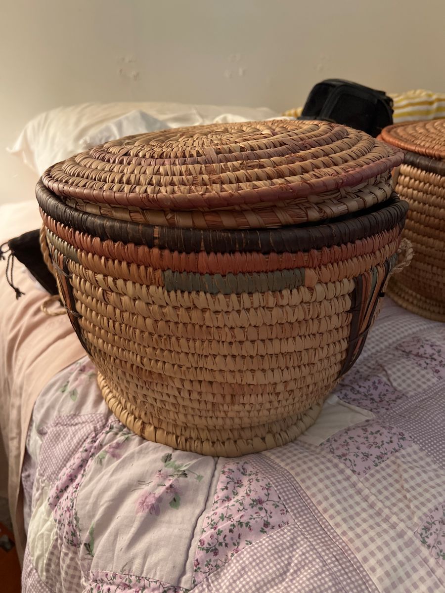 One of two Graduated straw baskets