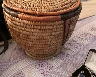 One of two Graduated size straw baskets