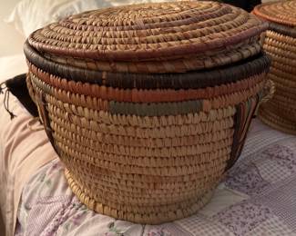 One of two Graduated straw baskets