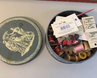 Tin with sewing supplies $20