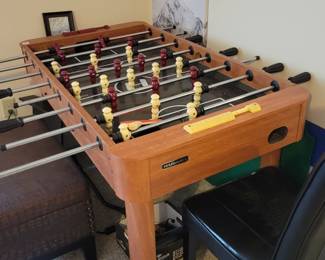 Game table with foosball, pool and ping pong