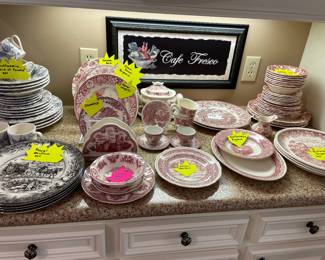 Lots of red & white china of different brands throughout house