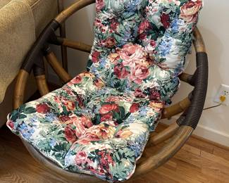 Round papasan chair with floral cushion