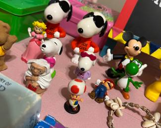 Collection of Mickey Mouse figurines and toys