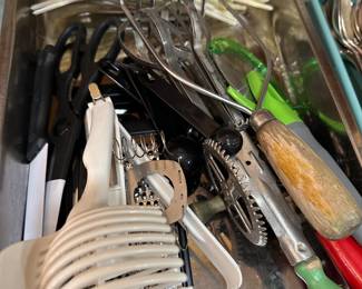 Assorted kitchen utensils and serving tools