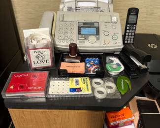 Fax machine with phone and office supplies