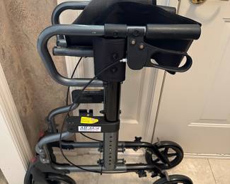 Foldable rollator walker with seat