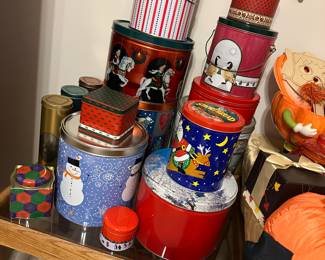 Collection of vintage holiday and decorative tins