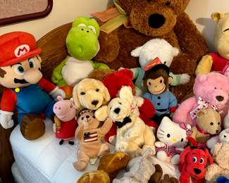 Assorted plush toys including Hello Kitty and Nintendo characters