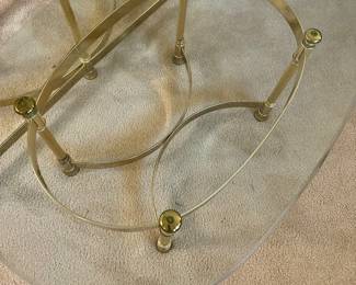 Triangular glass and brass coffee table