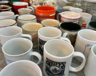Collection of vintage ceramic mugs and cups