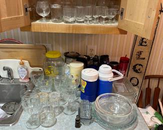 Assorted drinking glasses and glass mixing bowls