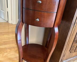 Mahogany accent table with single drawer and curved legs