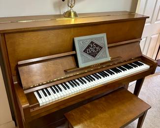 Upright piano with matching bench
