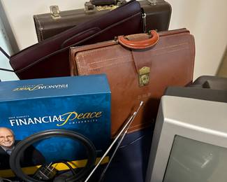 Vintage leather briefcase with computer monitor and Financial Peace kit