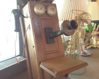 Antique Western Electric wall phone... not in working condition of course but the case is in mint condition! A true Conversation Piece for sure!