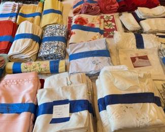Vintage tablecloths, napkins, throw blankets