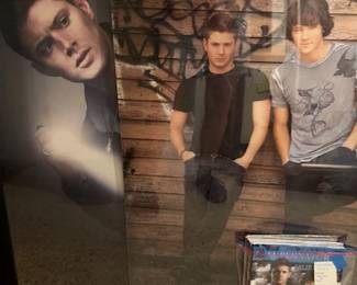 Supernatural TV show posters, magazine, and Castiel t-shirt