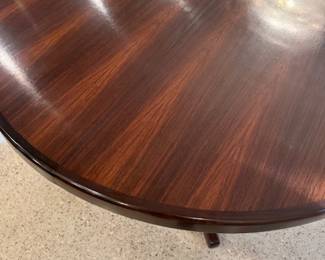 Rosewood dining table. 46 1/2" long oval, 2 leaves 19 3/4" wide