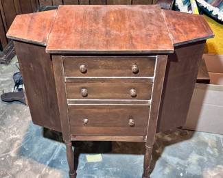 Vintage Sewing Cabinet - Make sure you go to our HiBid page to see all the items and more pictures.
