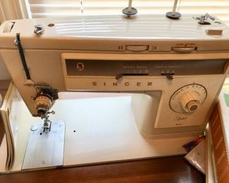 Singer stylist 513 sewing machine in cabinet
