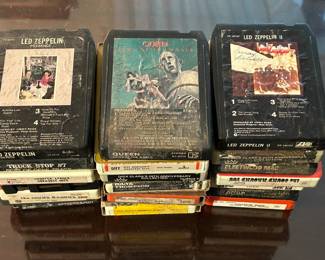 Multiple Turntables, Vinyl Records (33RPM & 45RPM), 8 Track Tapes, Cassette Tapes and CD's.