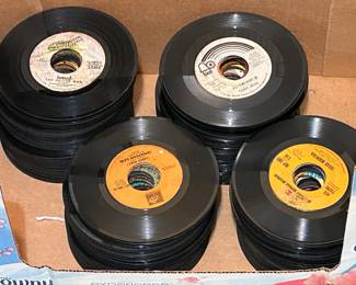 Multiple Turntables, Vinyl Records (33RPM & 45RPM), 8 Track Tapes, Cassette Tapes and CD's.