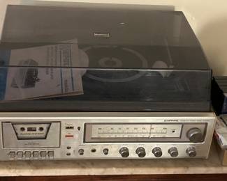 Multiple Turntables, Vinyl Records (33RPM & 45RPM), 8 Track Tapes, Cassette Tapes and CD's.