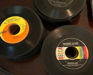 Multiple Turntables, Vinyl Records (33RPM & 45RPM), 8 Track Tapes, Cassette Tapes and CD's.