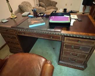 This desk comes apart in 4 pieces for easy removal and set up.