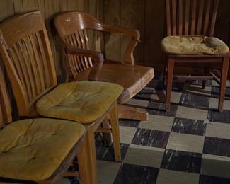 Oak office chair and side chairs.