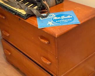 Accordion, cedar chest