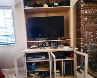 entertainment center and large tv