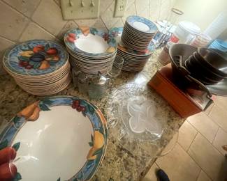 Dish set with bowls, salad plates, dinner plates, coffee mugs and saucers. Tortilla warmer, large teakwood salad bowl with serving pieces and bowls.