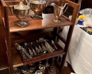 Sterling silver coffee set, Joan of Arc flatware, various coaster sets, cream/sugar, candle sticks.