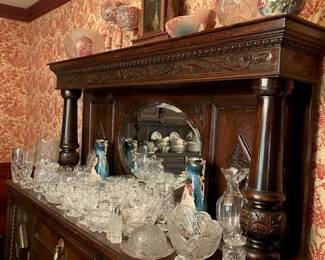 Carved/mirrored buffet.  Antique cut glass collection