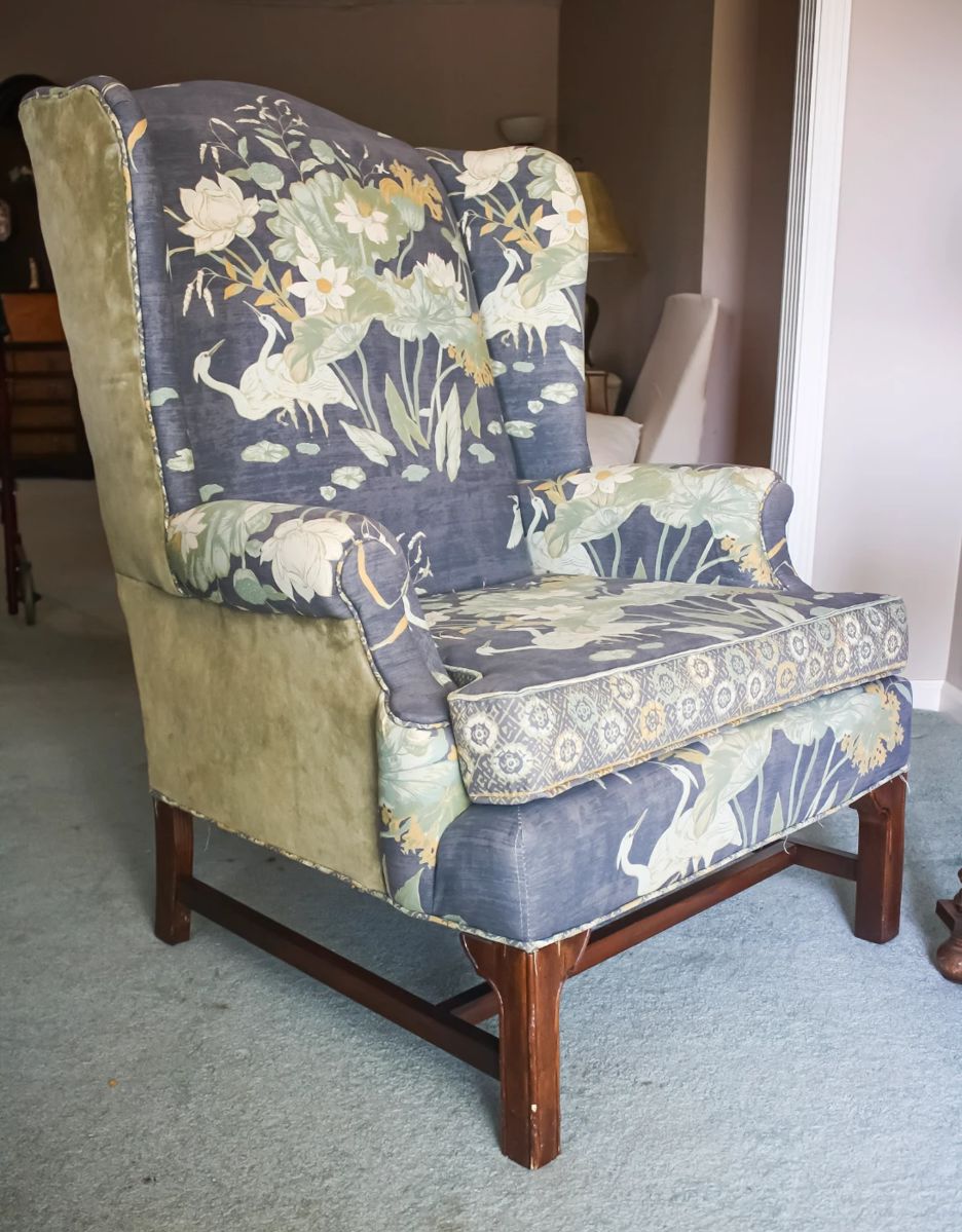 Vintage Floral Wingback Chair- $150. Beautifully upholstered in a bold floral fabric, this classic wingback chair offers both charm and comfort.