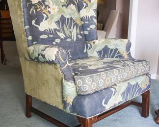 Vintage Floral Wingback Chair- $150. Beautifully upholstered in a bold floral fabric, this classic wingback chair offers both charm and comfort.