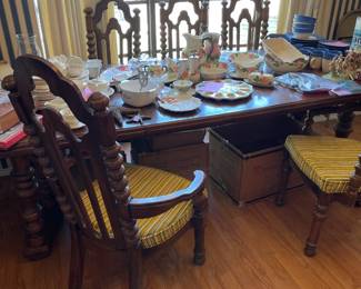 Huge table with leaves can fit 10-12 for dinner.