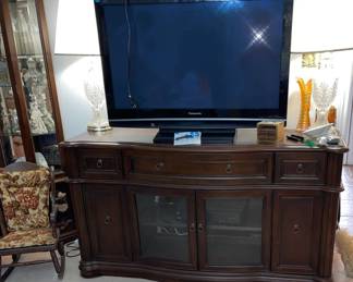 Great TV cabinet - side doors swing open to reveal additonal DVD, VHS, Book storage