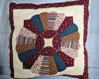 Quilts, Pillow, and Porcelain Doll